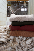 A stack of Australian Merino knitwear