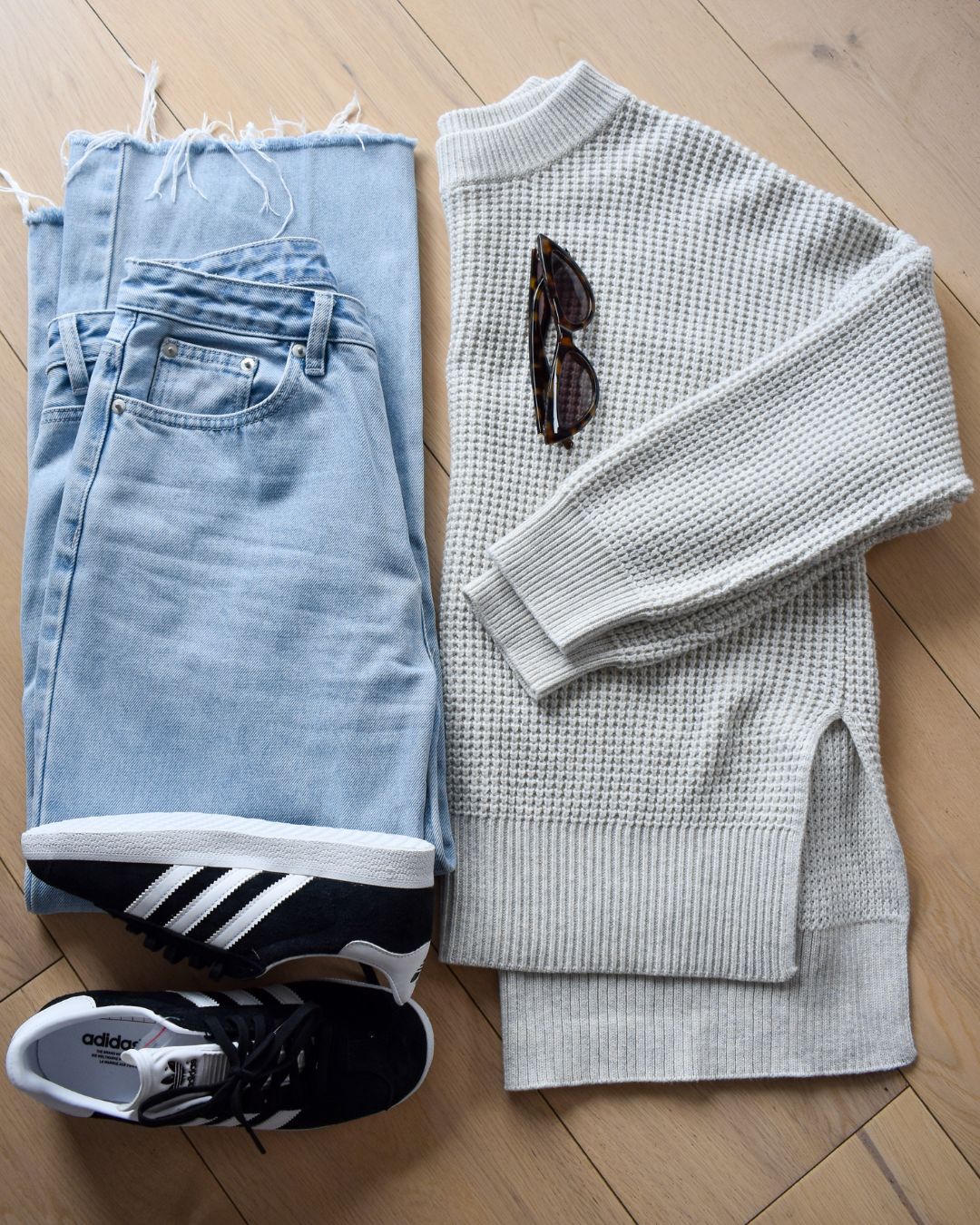 A flat-lay or a waffle knit with jeans for spring